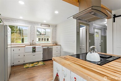 The heart of the home is this quintessential farmhouse kitchen which has been recently updated.