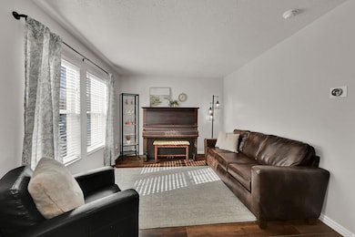 Living area with lots of light and LVP wood floors