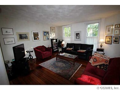 Living Room. Maple floors, original south-facing w