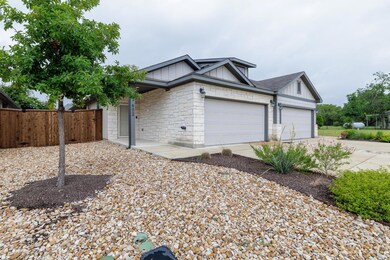 Ranch-style house with board and batten siding, a