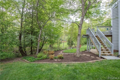 View of yard featuring a deck