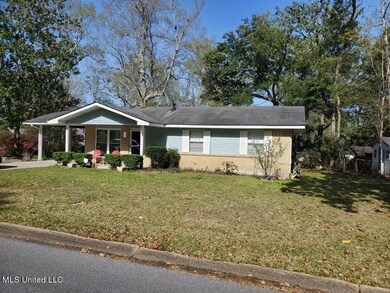 Front view with carport and covered fron