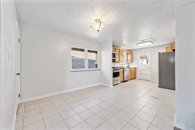 Looking from the living area to the large kitchen/
