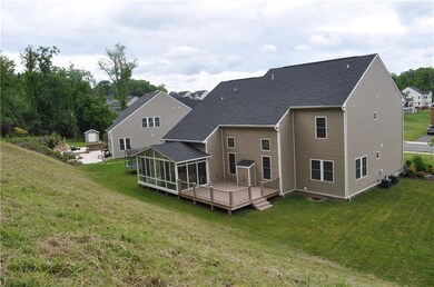 Rear yard and view of home. Lot is pie shaped and 