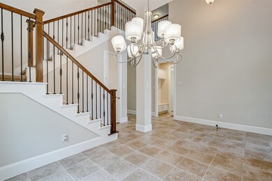 This spacious dining room is perfect for entertaining and will accommodate a large table for 8 dinner guests and a hutch, buffet or china cabinet.