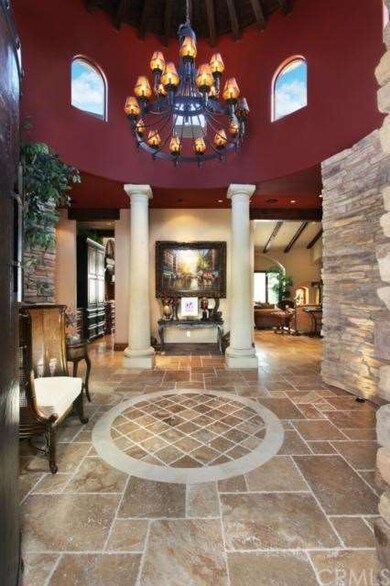  VALUTED ROTUNDA WITH INTERIOR STONE WALLS AND CAS