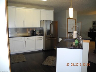 Loads of cupboards and granite counter tops.  Nice