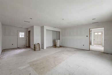 Another view of kitchen. Utility closet is at cent