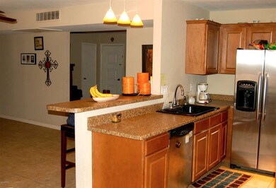 Open, updated kitchen is warm and inviti