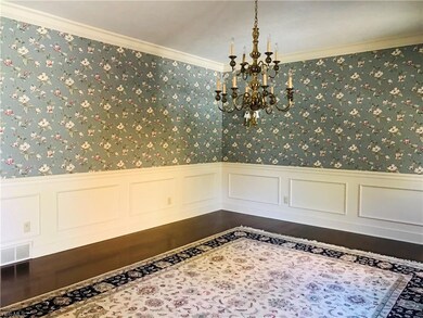 Dining room with hardwood flooring