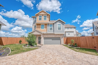 Welcome to this contemporary 3-story home in the m