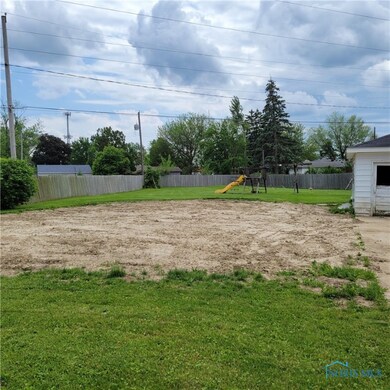 Backyard. Pool was filled in.