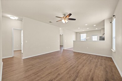 Empty room featuring plenty of natural light, dar