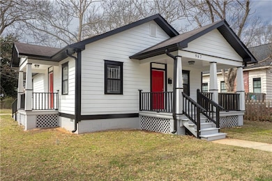 Bungalow-style house with covered porch, roof with