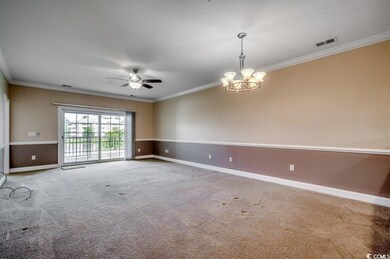 Carpeted empty room with ceiling fan with notable 