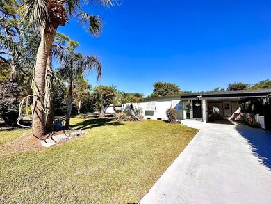 View of yard featuring a carport