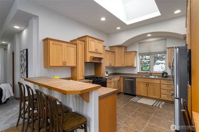 The kitchen is centrally located in the heart of the home.