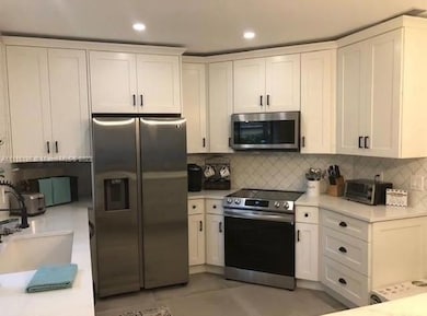 1143 Duncan Cir unit 104, Palm Beach Gardens, FL 33418 - photo 2