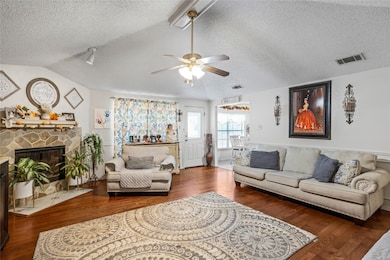 So much natural light, this family LOVES the fireplace