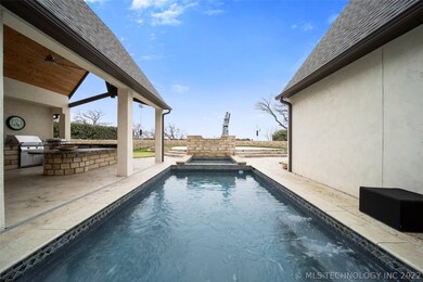 Heated salt water pool and spa nestled in a beauti
