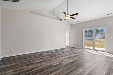 Spare room with dark hardwood / wood-style floorin