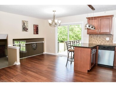 Kitchen and dining room have new flooring.