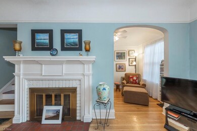 Fireplace and book nook. There is a 1/2 bath right around the corner.