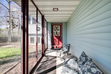 Enjoy the outdoors in this screened in porch