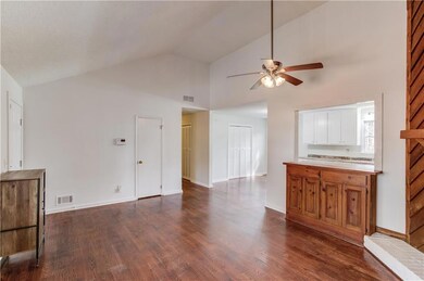 Kitchen featuring visible vents, dark wood-type fl