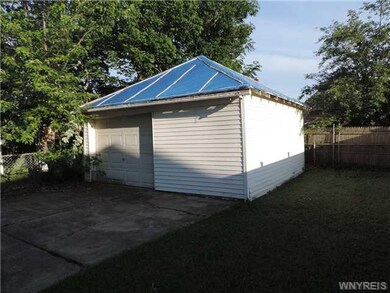 Backyard. The back yard & garage area.