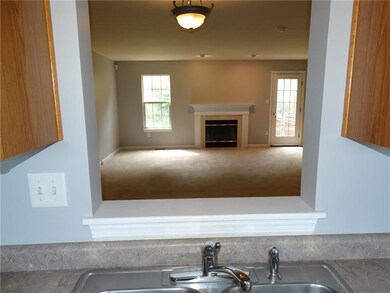 This kitchen boasts of the see - through passage w