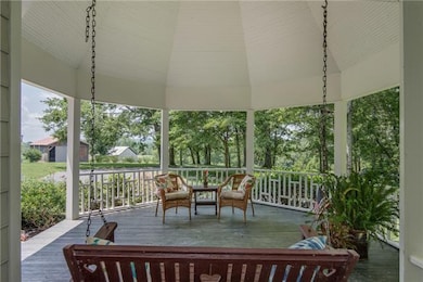 The fairy-tale gazebo porch is over 20 feet tall and has a ceiling fan to keep a breeze going at all times.
