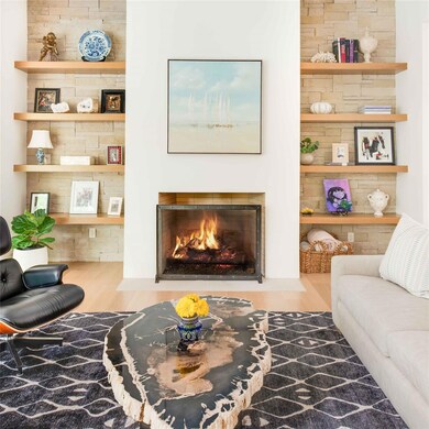 Sitting room with Isokern fireplace & open shelvin