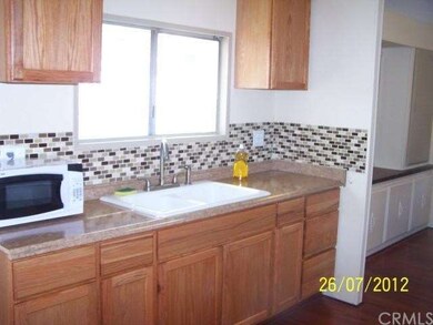 Kitchen remodelled with new cabinets,tops and floo