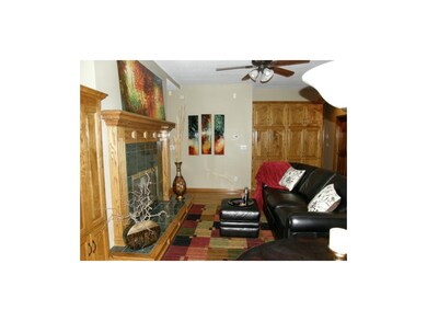 Cozy Hearth Room With View of Pantries