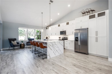 1511 Whispering Oaks Cir, Naples, FL 34110 - photo 3