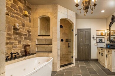Master bathroom with custom stone & tile work