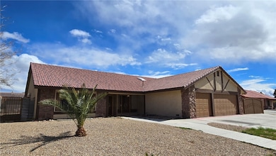 View of front of property featuring a tile roof, c