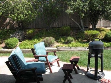 Surrounded by lush vegetation, this wind-protected