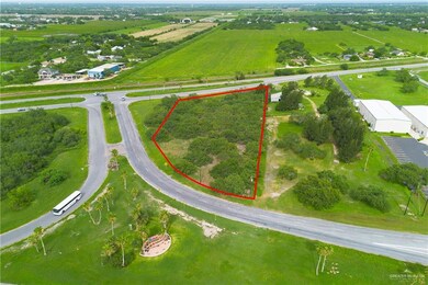 Birds eye view of property featuring a rural view