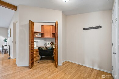 Looks like a closet but its really a built-in office nook.