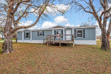 Front of house with a deck