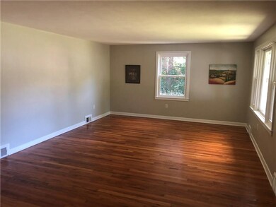 Large living room with beautiful hardwood floors a