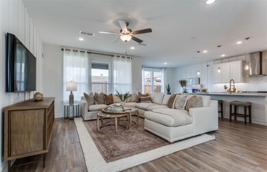 Spacious gathering room *Photos of furnished model