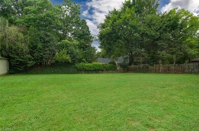 Huge, flat and fenced!  This backyard is perfect for pets, children and entertaining!