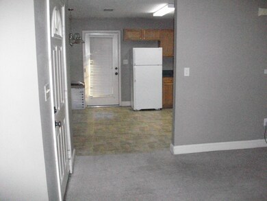 LIVING VIEW INTO KITCHEN