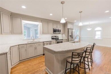 Pass through serving bar to the sunroom area.
