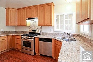 New cabinets and stainless steel appliances.