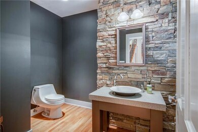 Powder room off the main entry
