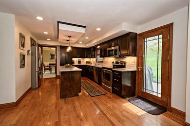 Updated Kitchen with Granite Counters and Subway T